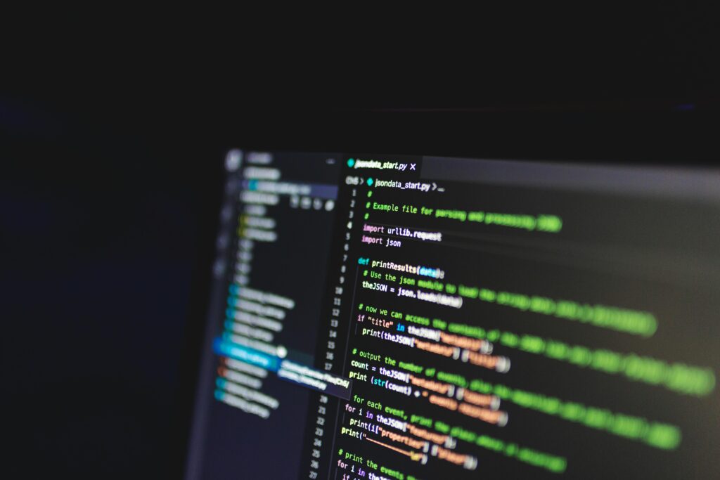 Developer coding in Node.js terminal while working on the Best OpenAI API Starters for Node applications.