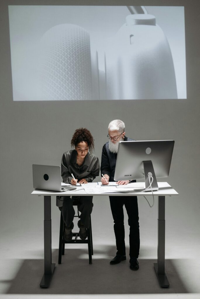 Creative marketing team reviewing digital campaigns built with the Best AI Image Generators for Ads.